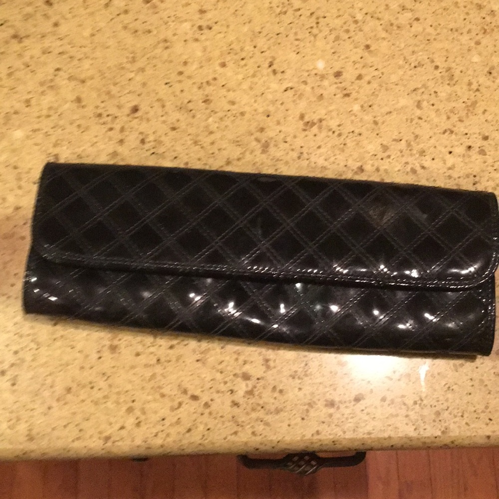 Black faux leather clutch